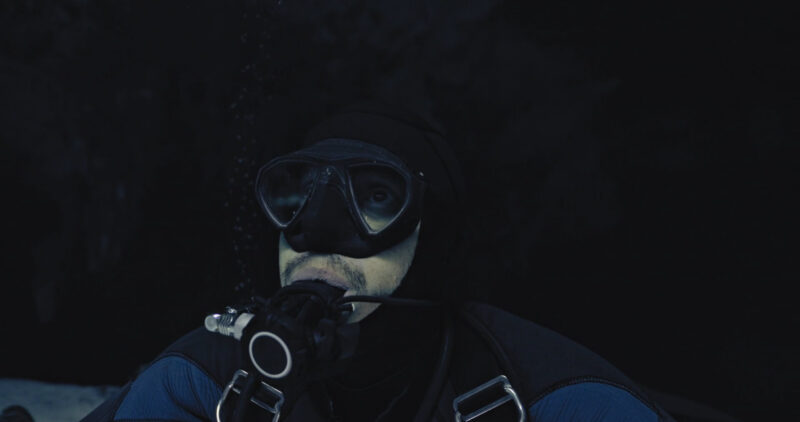 Man Diving with a Scuba Mask